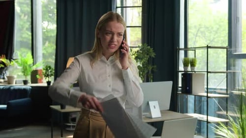 Annoyed Mad Angry Businesswoman Employer Manager Woman Caucasian Girl Talk Mobile Phone in Office