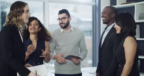 4k video footage of a group of businesspeople shaking hands in an office