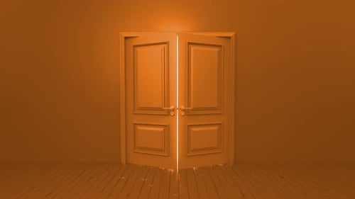 Door opening to bright light in empty room
