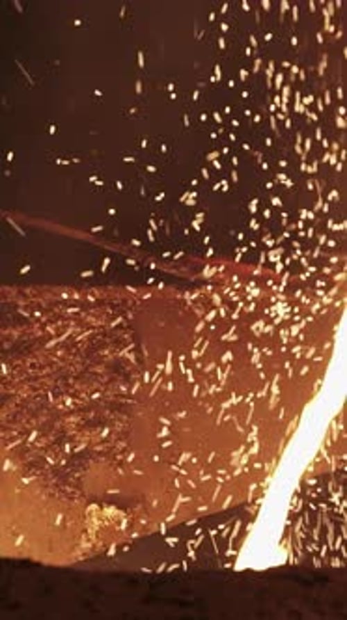 Molten Metal Pouring in an Industrial Foundry Showcasing a Blend of Artistry and Engineering Stock