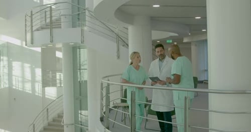 Doctors Meeting in Medical Hospital using Digital tablet Technology