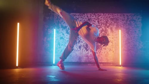 African American Bboy Performing Trick on Floor in Dance Studio Slow Motion Breakdance and Hiphop