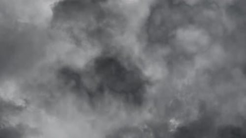 Lightning in the night sky strikes the dark clouds 4k.