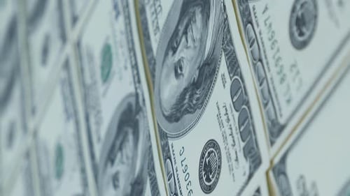 Sheet of US one hundred dollar banknotes. Cash money background. Vertical video