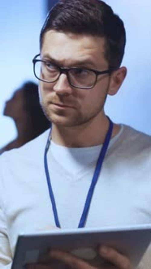 Man Using Tablet in Data Center