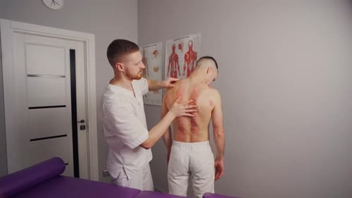 The Doctor Examines the Patient's Back