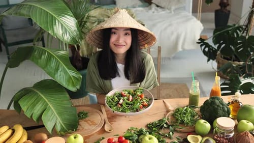 Smiling Woman with Healthy Salad and Fresh Produce