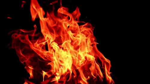 Fire blaze with red flame. Hot fireplace glowing with orange burn.