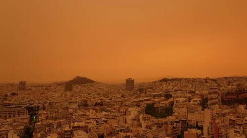 Orange atmosphere over Athens from Sahara dust storm
