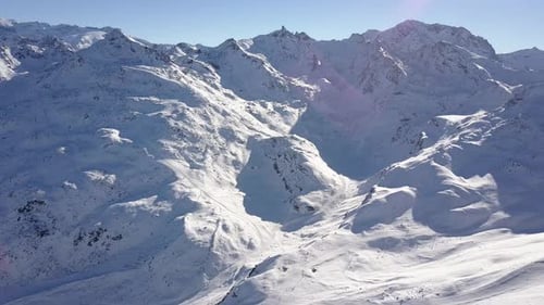 Aerial flight above stunning Alps.