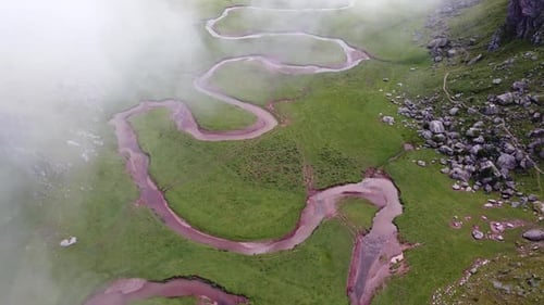 Spanish Pyrenees, Huesca, Spain - Aerial Drone View of Valle de Aguas Tuertas Valley with Curved Riv