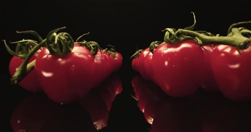 Juicy red cocktail tomatoes super close-up with dark background unique high resolution 4k shoot Came