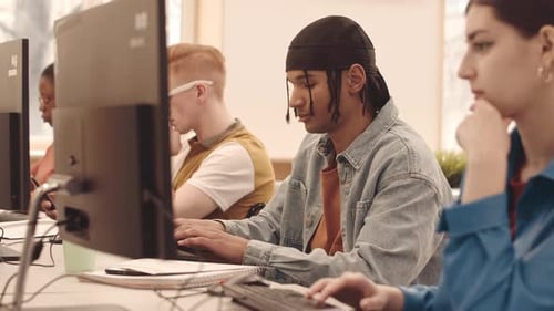 Multicultural College Students Studying on Computers
