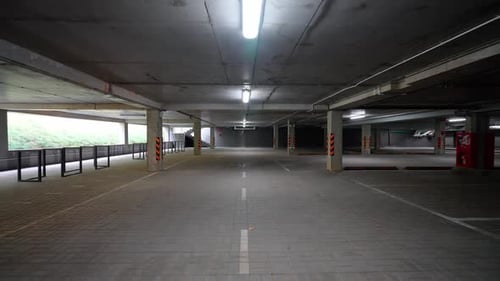 Empty Space of Underground Parking Smooth Camera Movement in the Parking of an Office Building with