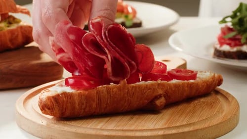 Delicious Croissant Sandwich Made with Egg and Avocado and Salmon Traditional French Cuisine France