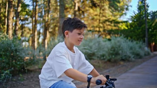 Active Boy Riding Bicycle Summer Forest Closeup Kid Having Fun Leaning Cycling