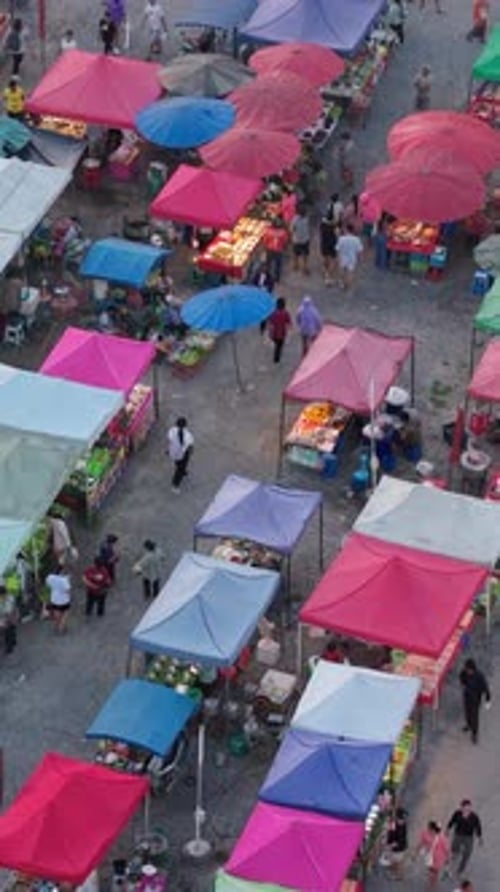 Aerial View of a Large Local Street Market in Thailand with the Colorful Awnings