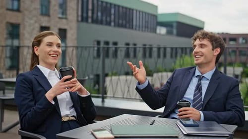 Smiling Colleagues Enjoying Coffee in Outdoors Cafeteria Closeup Business Break