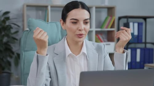 Businesswoman Explains During Video Conference Call