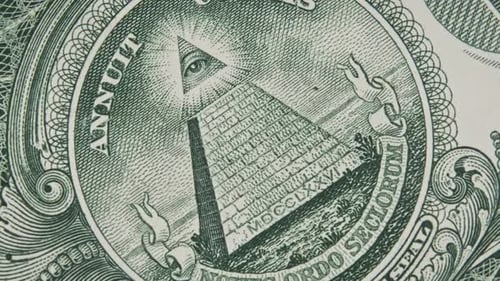 The AllSeeing Eye Sign Rotates on a One Dollar Bill CloseUp