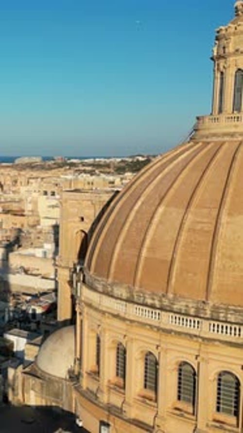 Aerial drone view of the walled city of Valletta, Malta, surrounded by the Mediterranean sea in dayl