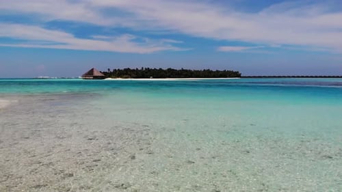 Drone Flies From Island To Island In The Maldives. Maldivian Resort Island