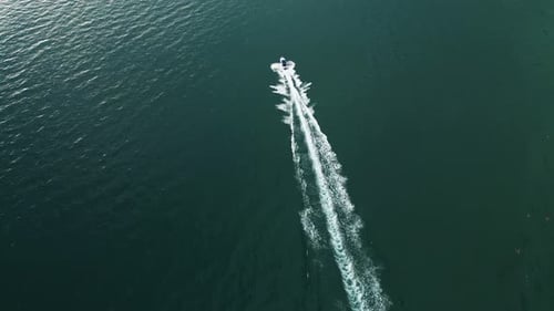 Drone View of a Boat the Turquoise Clear Waters Top View of a Motor Boat Sailing to the Sea