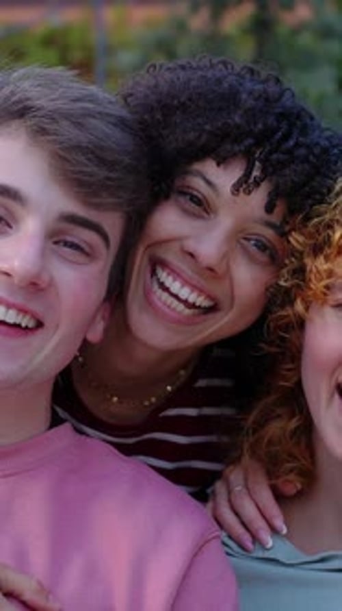 College Student Friends Smiling at Camera Posing for a Group Portrait at Campus