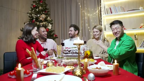 Friends Celebrate Christmas with Festive Holiday Dinner