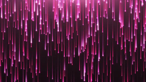 Rose gold shining particles slowly falling on dark background with soft light. Crimson particles
