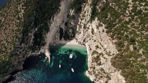 Sailboat Luxury Cruise Trip View From Above of White Boat on Deep Blue Water