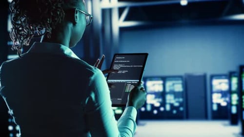 Woman Runs Code in Data Center