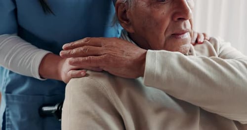 Elderly Man Receives Comforting Touch in Hospital