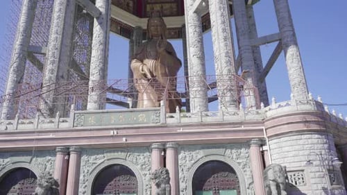 Statue Of Guanyin The Goddess Of Mercy In Kek Lok Si Temple In Malaysia - tilted wide shot