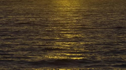The sea and the beautiful reflection of the sun in the sea.