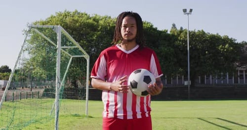 Video of african american football male player with ball