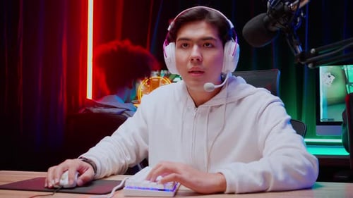 Young Adult Gamer Focused on Competitive Online Gaming