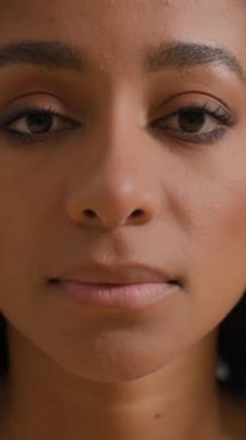 Extreme Close Up Headshot Indoors Female Portrait African American Woman Girl Serious Calm Face