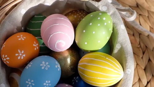 Colorful Easter Eggs in Woven Basket