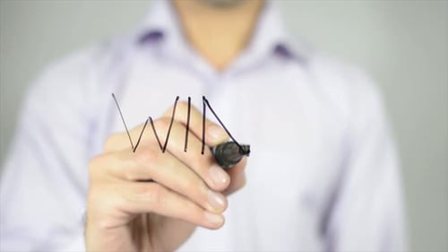 Hand Writes 'WIN' on Glass Surface with Marker