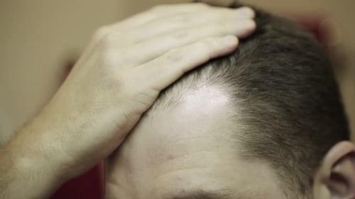 Attractive Young Man Touching His Hair Close Up Haircare Beauty Concept