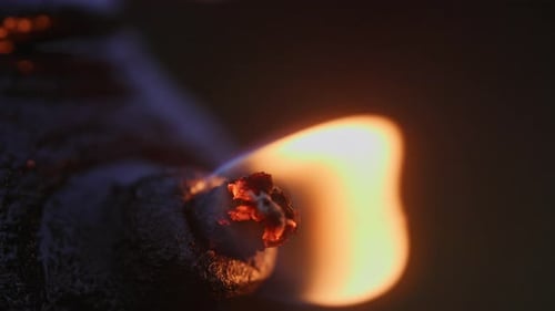 Oil Lamp Flame at Night