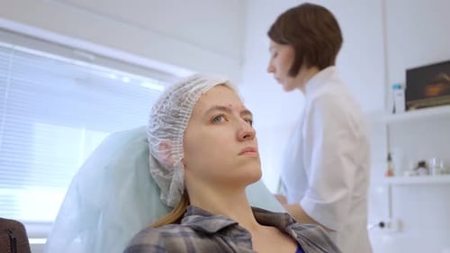 a Young Woman at a Cosmetologistdermatologist Getting Rid of Wrinkles A Drug for Antiaging
