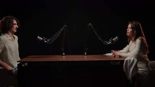 Engaging Storytelling Unfolds in a Dynamic Podcast Interview Session at a Cozy Studio