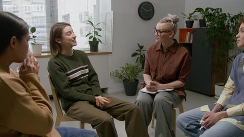 Group of Friends Talking in a Bright Room