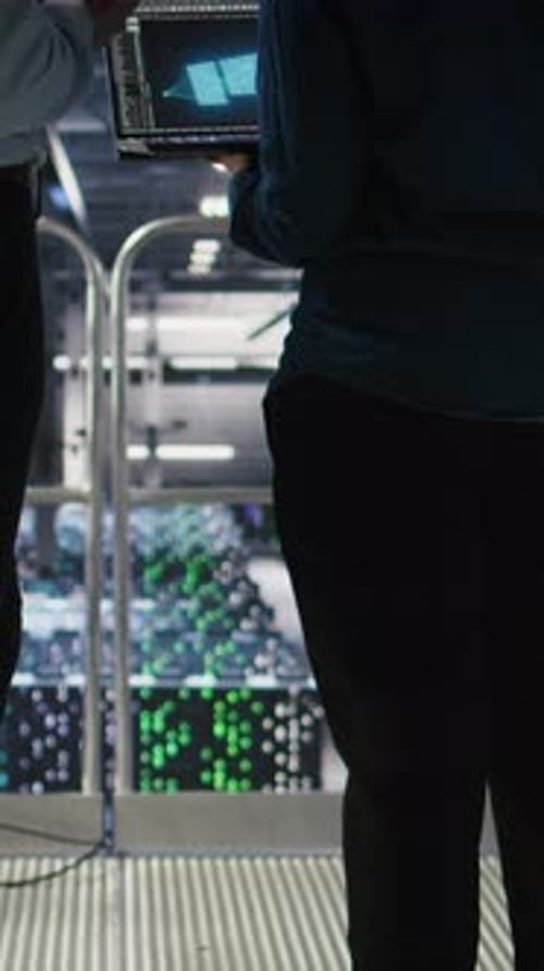 Vertical Video Data Center Manager Overseeing Work Done By Admin Using AI LLM Visualization