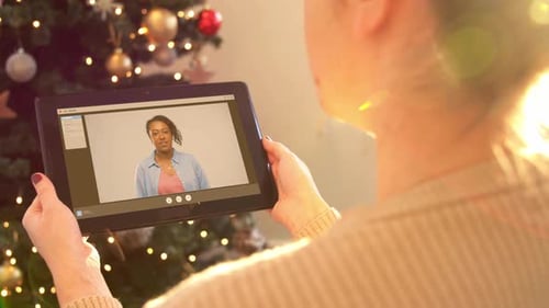 Woman Video Chatting During Christmas Holiday Season