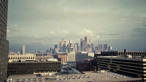 El horizonte lejano de la ciudad bañado por el tranquilo resplandor matutino entre estructuras de concreto