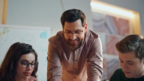 Business Meeting with Team in Modern Workplace