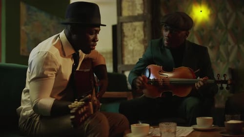 Musicians Compose Music in Dimly Lit Club